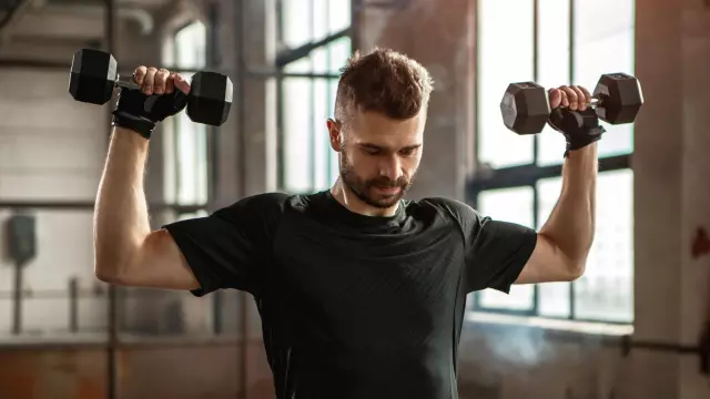 Stop doing overhead presses until you fix these 3 huge mistakes, says a personal trainer